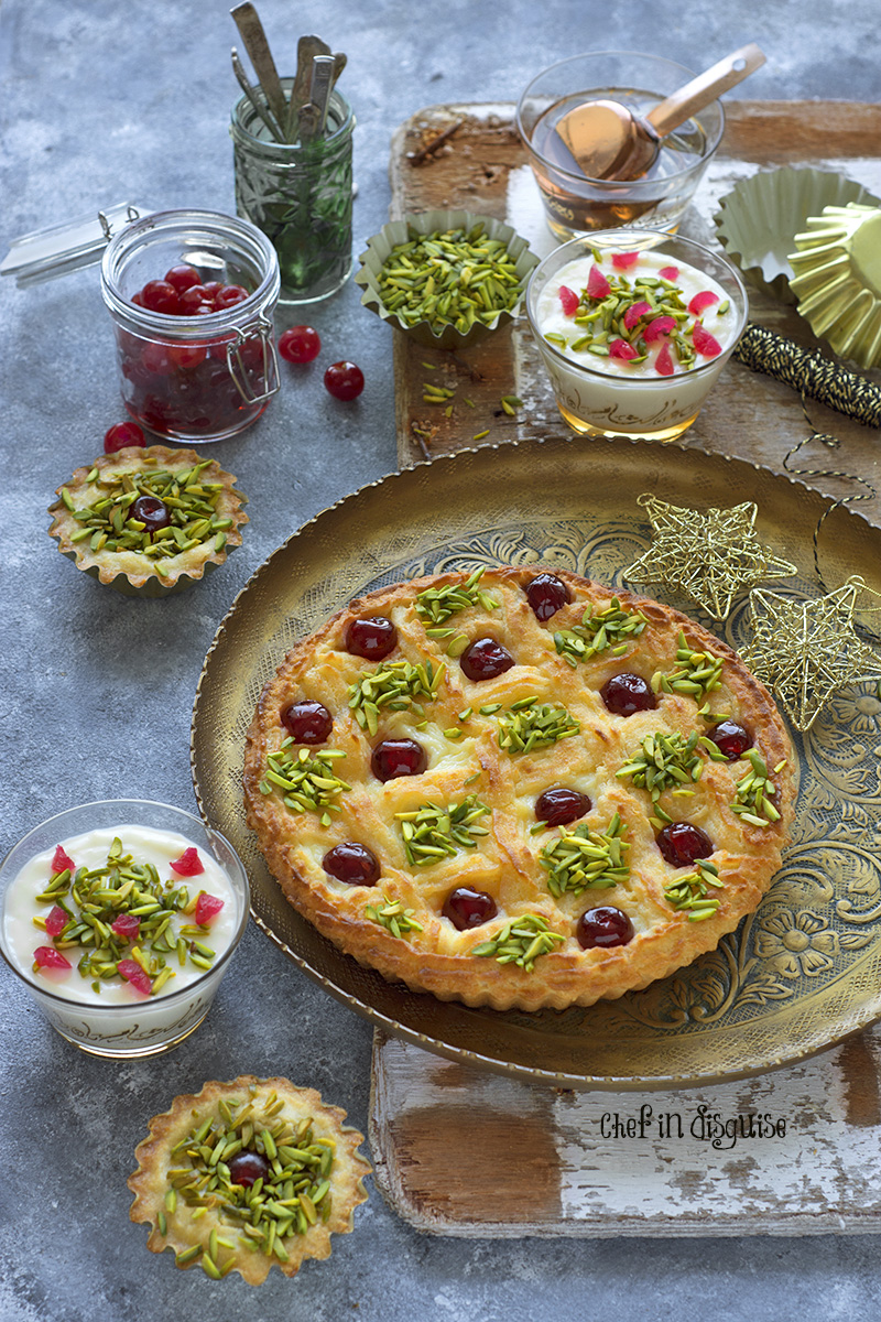 3 desserts in one! the crust is a cross between basbousa/ harissa and a cake. The filling is a thick muhalabia (milk pudding) that provides the perfect contrast in color and texture to the golden brown crust. A feast for the eyes and taste buds