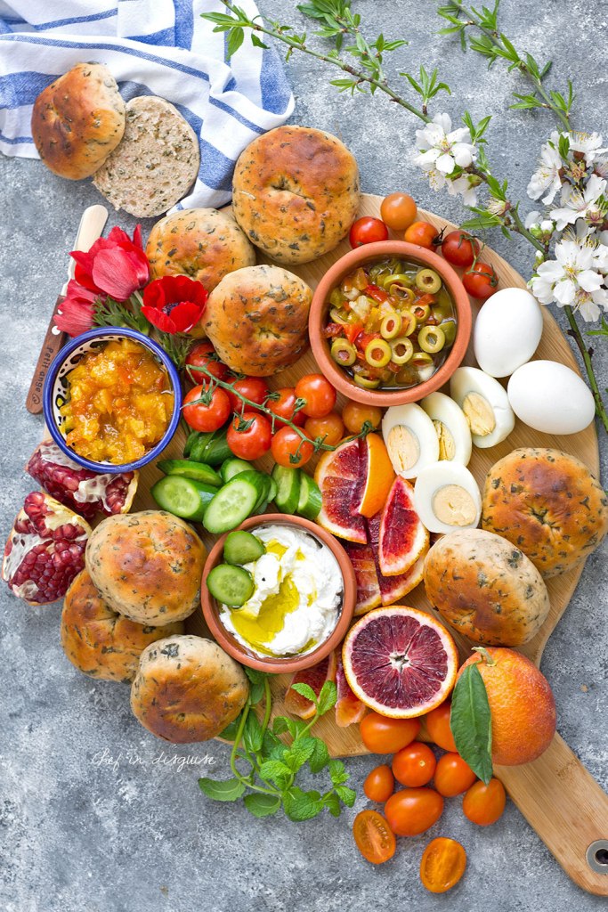 Breakfast platter with zaatar rolls , fruits and eggs